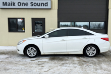 2013 Hyundai Sonata with professional window tint in North Bay